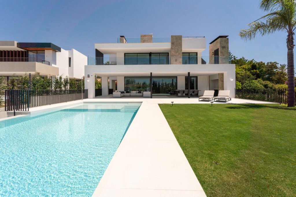 Modern luxury villa in Spain with private pool, garden and contemporary architecture