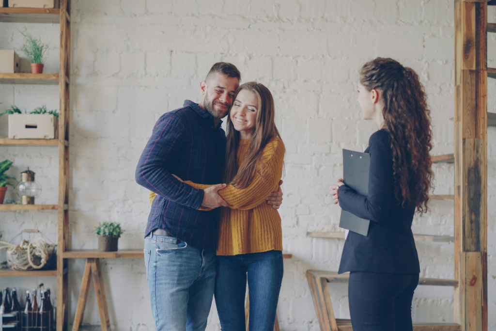 Couple buying property in Spain with real estate agent