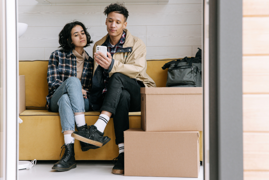 Couple moving into new home in Spain with boxes