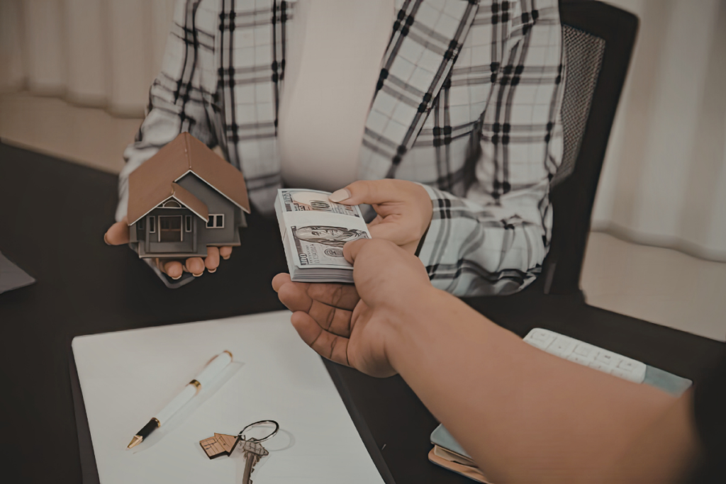 Paying for property in Spain with cash and house model