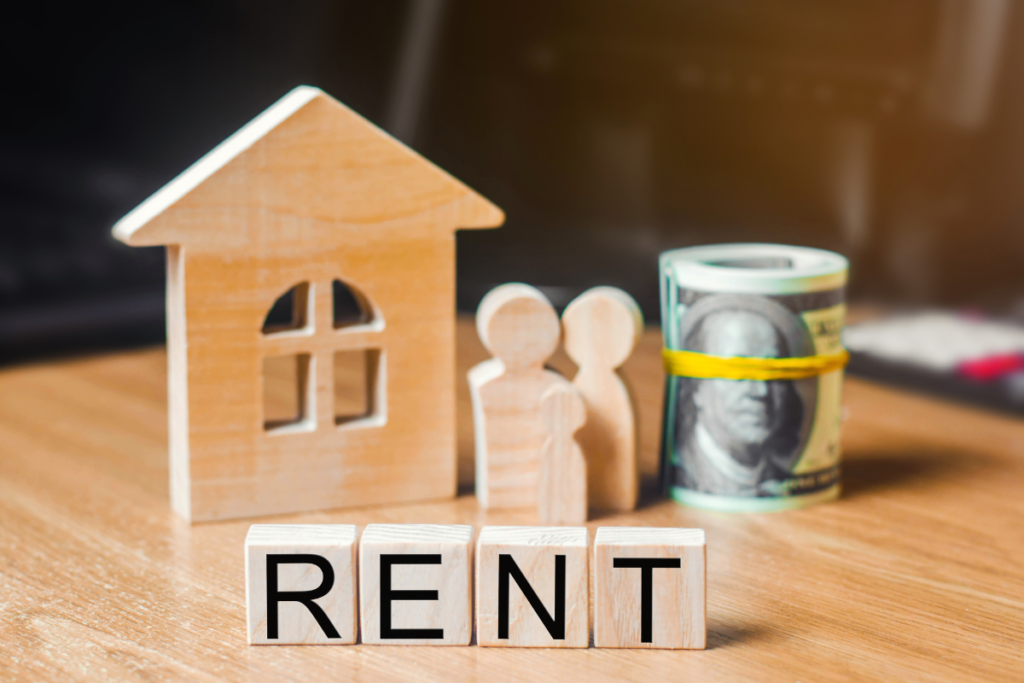 rent villa in Spain concept with house model and cash for rental income