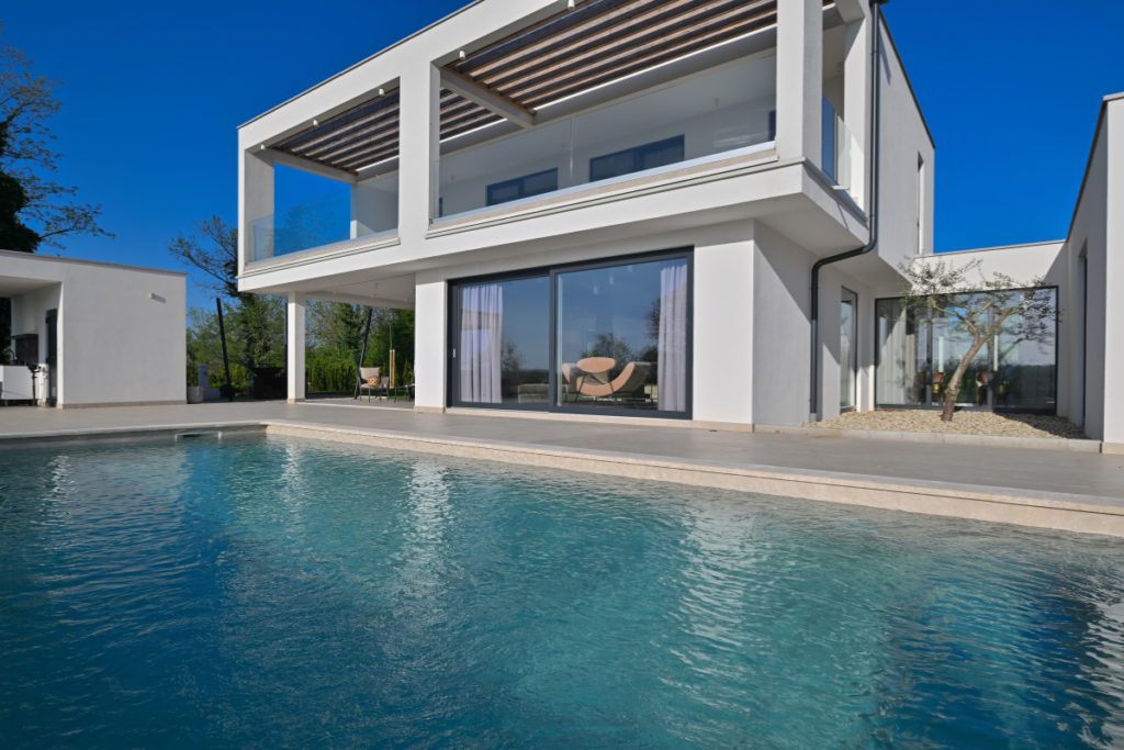 modern villa in Spain with private pool and large glass windows